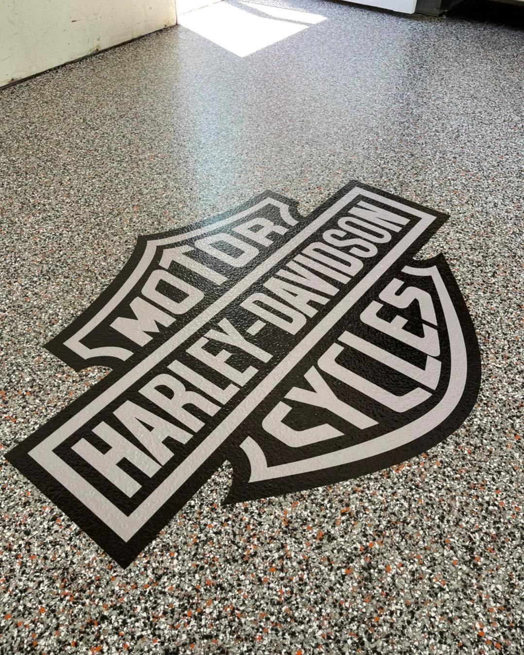 Harley-Davidson logo embedded in garage floor coating