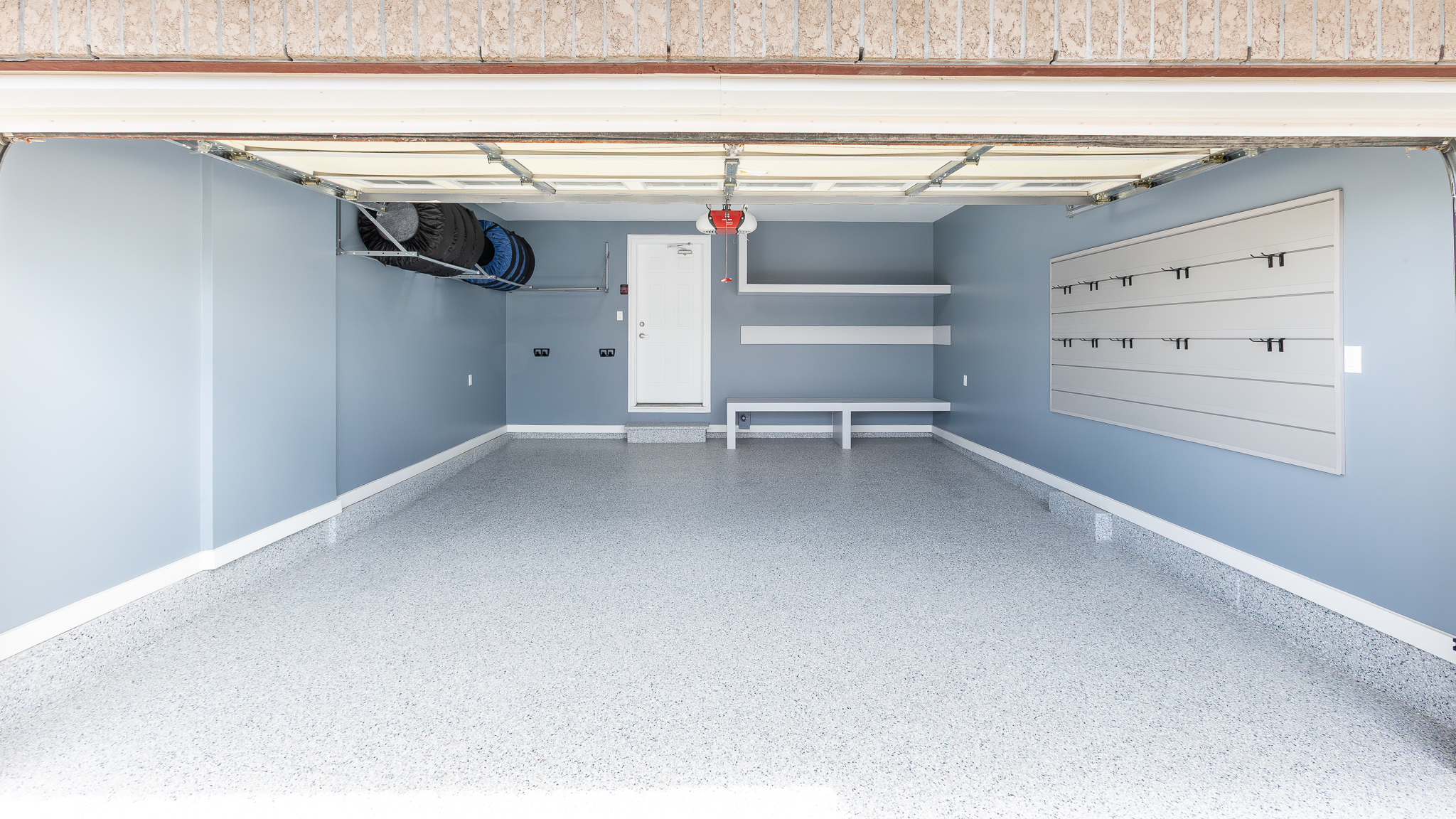 Floating shelving with overhead tire storage, Pinnacle Garage Works completed job