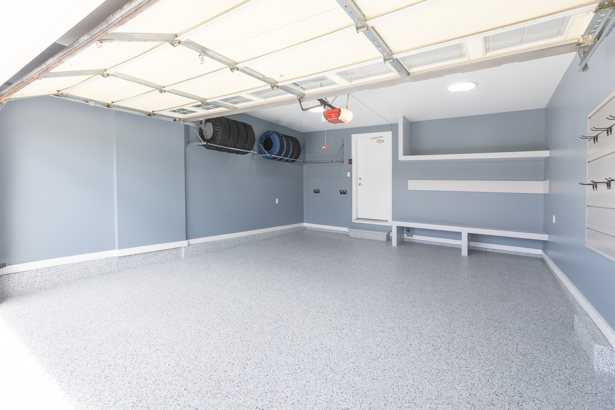Ceiling-mounted tire storage detail, Pinnacle Garage Works completed job